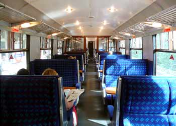 inside open seating Metropolitan Heritage Train.