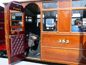 vintage railway train carriage coach with open door people sitting inside