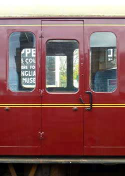 Window view suburban non-corridor compartment railway carriage.