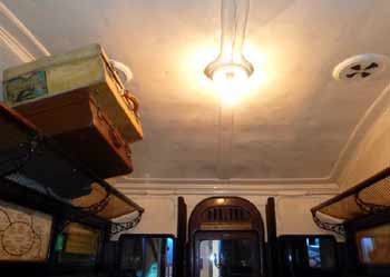 Ceiling view - ventilators, lights, luggage racks