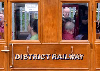close=up view signs District Railway Coach 100