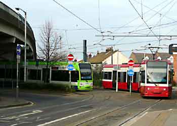 Tramlink trams in new and old livery