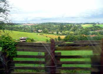 View through a (scratched) Metropolitan line train window between Chesham and Chalfont & Latimer.