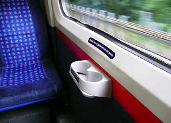 Cupholder by window inside Chiltern 165 train.