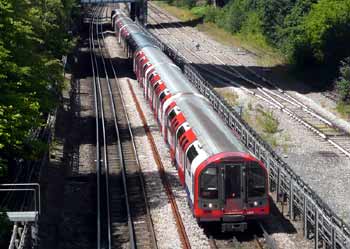 Central line train alongside New North Main Line