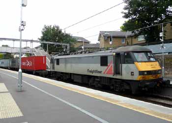 Freight train passing through Highbury and Islington station.