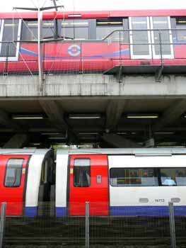 side view Jubilee line DLR trains at Canning Town station.