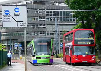 tram on tarmac highway.
