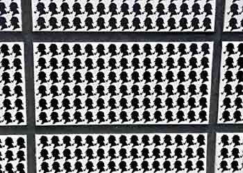 tiles with small silhouettes of Sherlock Holmes at Baker Street station.