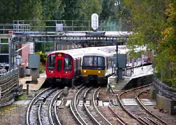 Chiltern 165 and S stock at Rickmansworth station.