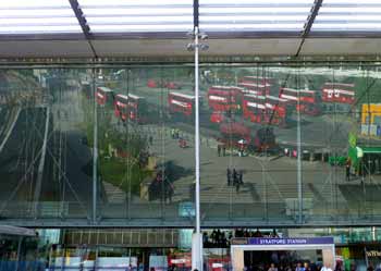 bus station roof reflection at Stratford Station London.