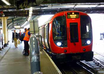 S Stock Circle line underground train at platform 1 Edgware Road (subsurface) station.