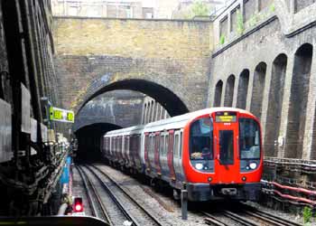 S7 Train Travelling Through Brick-Lined Deep Cutting.