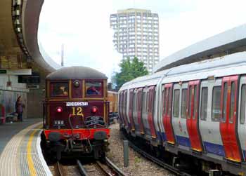 Sarah Siddons electric locomotive passing S stock train at Wood Lane station.