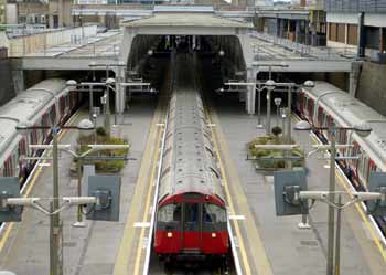 looking down upon trains and platforms at Uxbridge station.