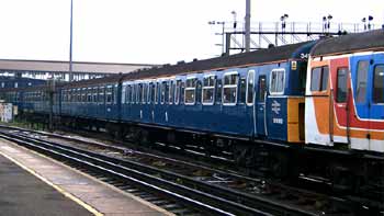 VEP trains in SWT candy stripe and BR blue.