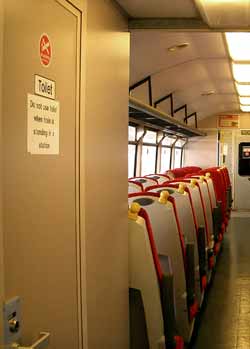 inside Class 144 train next to toilet