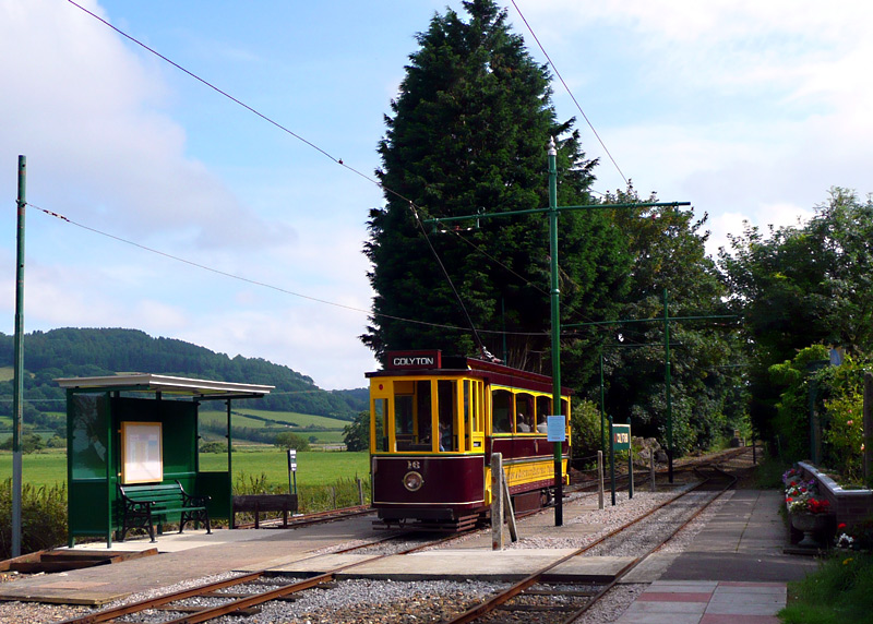 Tram No.16 departs from Colyford Junction.