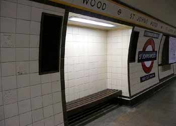 Art Deco wall tiling some with motifs St Johns Wood Underground station.