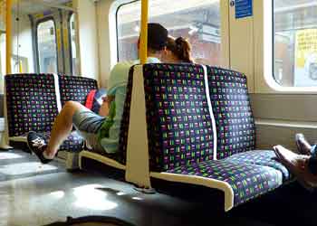 feet on train seat