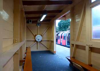 East Acton station - wooden platform shelter inside.