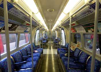 Full length view inside Jubilee line 1996 tube stock train.