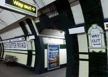 Gloucester Road Piccadilly line platform wall tiling.