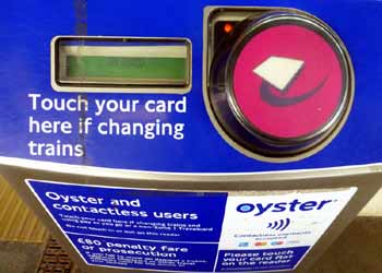 Pink route validator Oyster card reader.