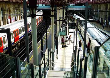 Thameslink and London Underground trains at Farringdon station London.