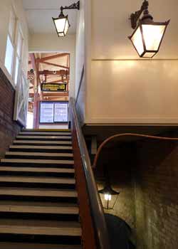 stairwell with ancient style lamps Hanwell station.