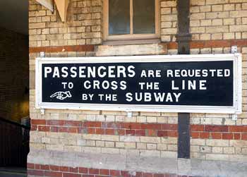 Finger pointer sign Hanwell station London.
