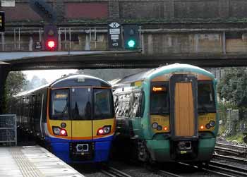 Overground and Southern trains at Brockley station.