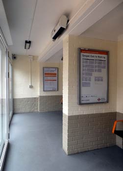 Inside Upper Holloway station waiting room.