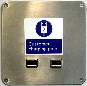 close-up view of USB power sockets class 710 train.