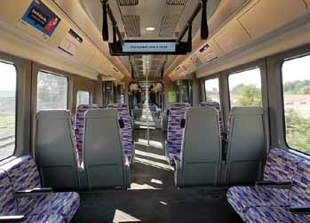 Class 345 train inside transverse longitudinal seating.