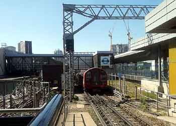 westbound Central line train departs from Stratford Station London.