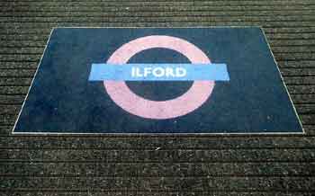 Ilford station name on floor mat TfL roundel.