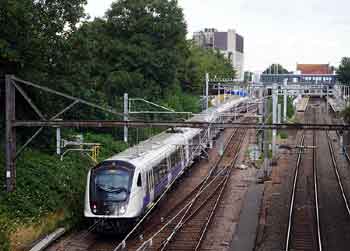 London Crossrail Elizabeth line older overhead wire support portal.