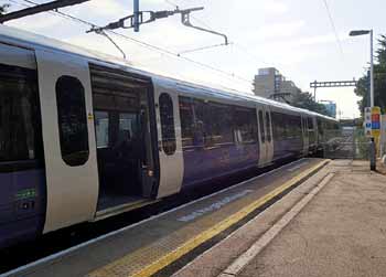 Crossrail Elizabeth line train at short platform.