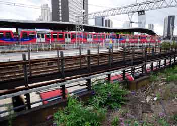Stratford station London DLR platform 4b Central line leaving tunnel.