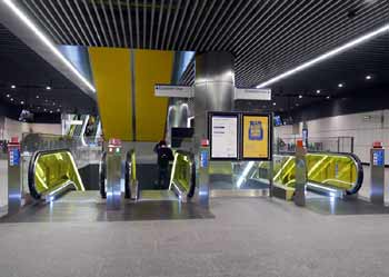 Elizabeth line Canary Wharf yellow escalators.