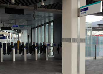Custom House station London ticket barrier gates.