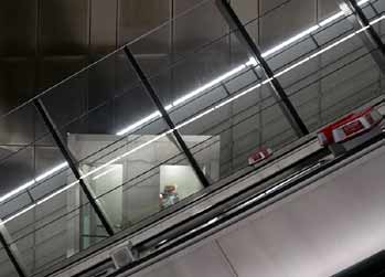 Side view inclined lift in escaalator shaft.