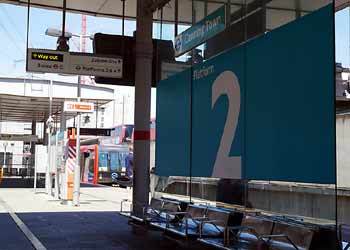 Large platform number Canning Town station DLR teal.