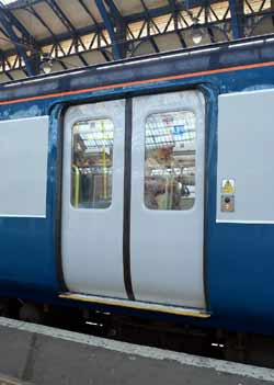 inside Class 144 train next to toilet