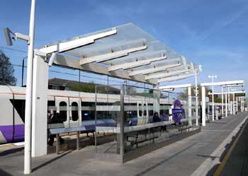 Glitzy Elizabeth line platform shelter Custom House station.