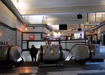 Clapham North escalators top ticket hall.