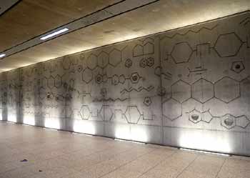 Concrete wall molecular chemistry frieze Hackney Wick.