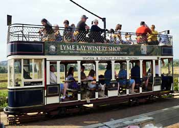 Side elevation of blue liveried Seaton Tramway Tram No. 8.