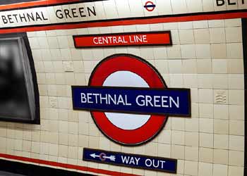 Art Deco wall tiling some with motifs Bethnal Green Underground station.